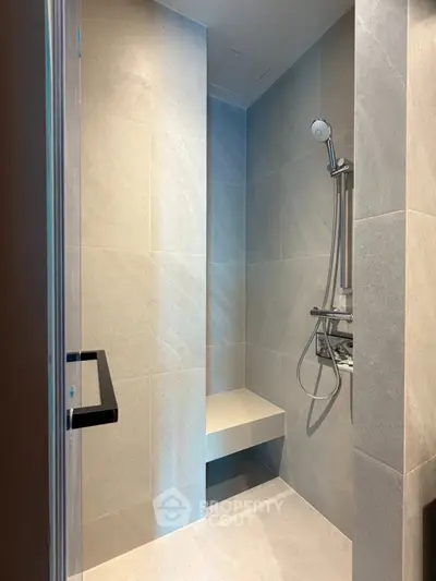 Modern bathroom with sleek shower design and elegant tile work