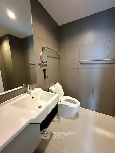 Modern bathroom with sleek fixtures and neutral tones