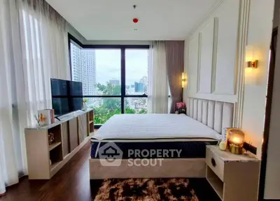 Luxurious bedroom with stunning city view and modern decor