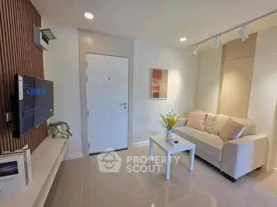 Modern living room with cozy sofa and stylish decor