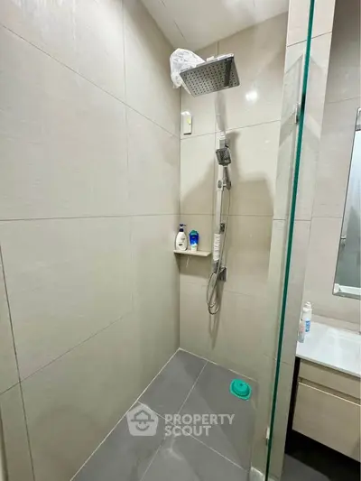 Modern bathroom with sleek shower design and contemporary fixtures