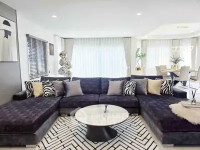 Luxurious modern living room with stylish decor and spacious seating area