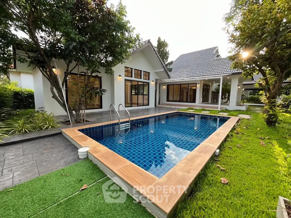 Stunning modern home with private pool and lush garden, perfect for luxury living.
