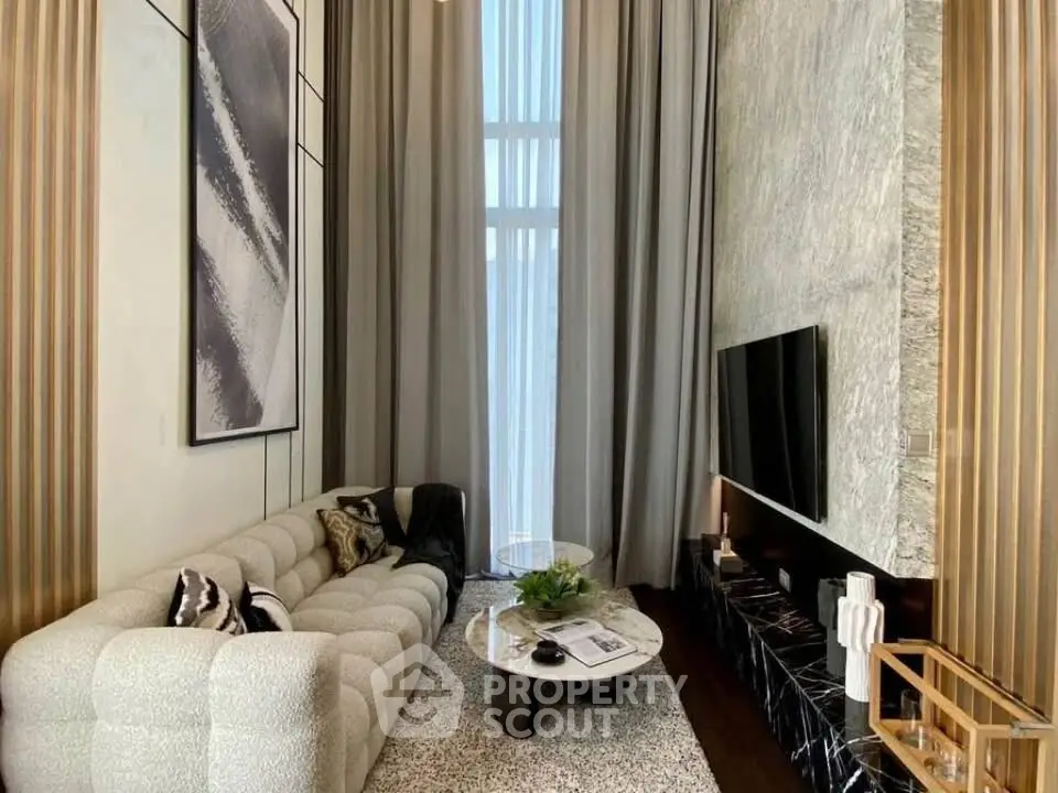 Luxurious modern living room with high ceilings and elegant decor