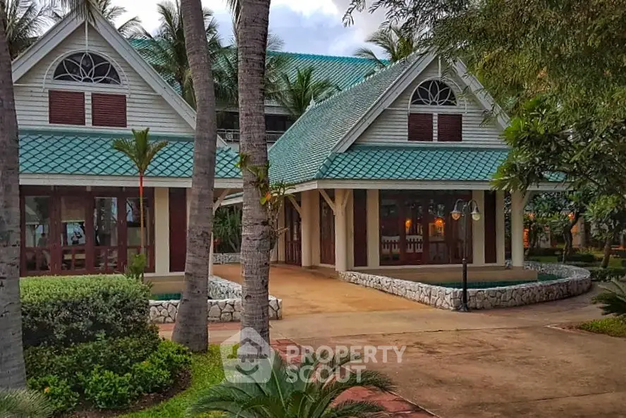 Charming tropical villa with lush greenery and unique architectural design