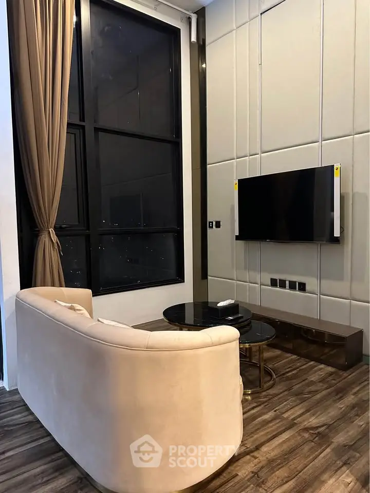 Luxurious modern living room with high ceilings and elegant decor