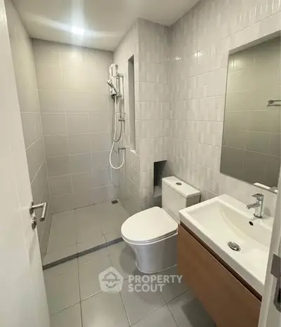 Modern bathroom with sleek fixtures and minimalist design in a contemporary home.