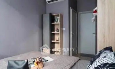 Cozy bedroom with modern decor and air conditioning unit