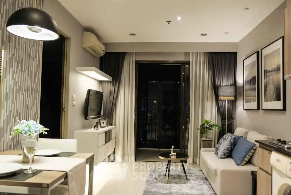 Modern living room with stylish decor and city view balcony