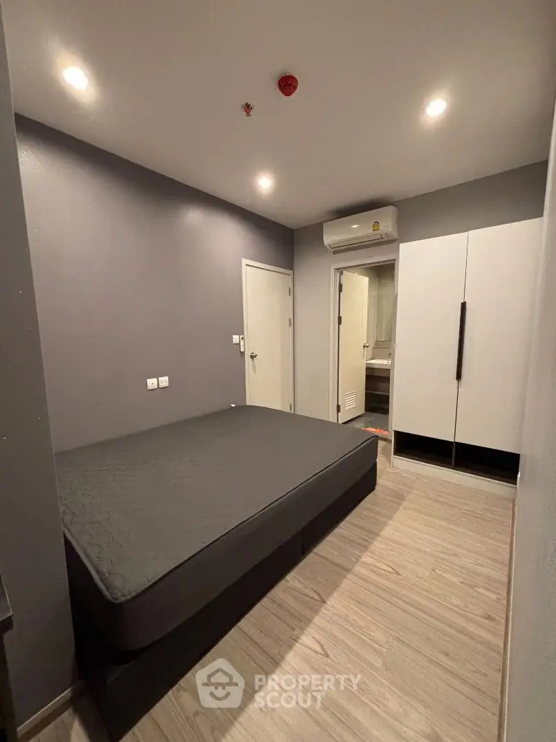 Modern bedroom with sleek design and minimalist furniture