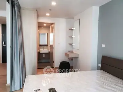 Modern bedroom with ensuite bathroom and stylish decor