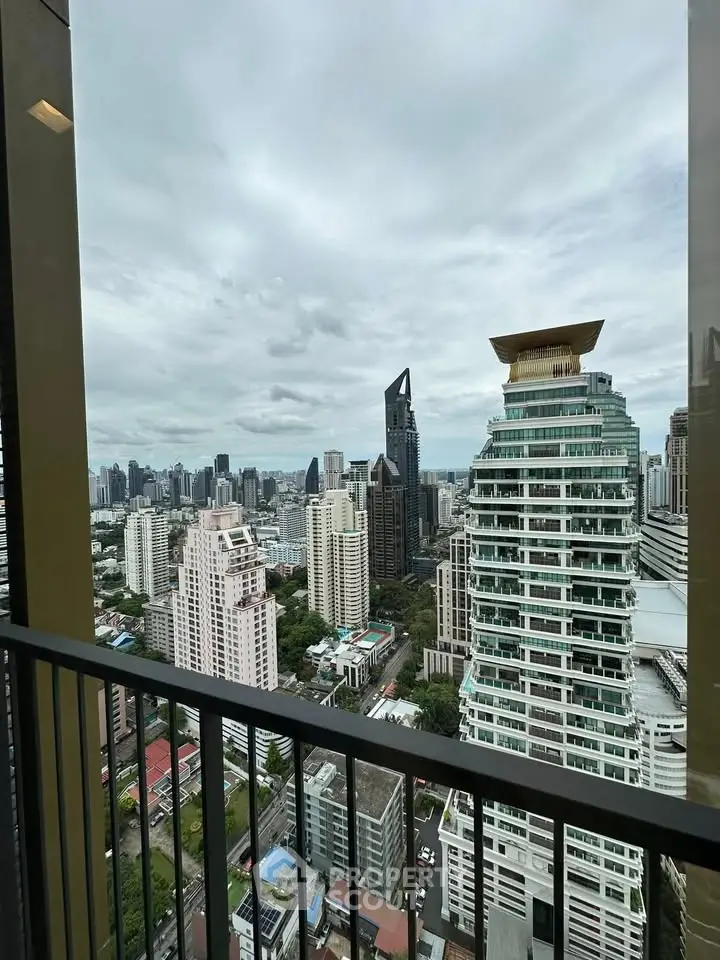 Stunning cityscape view from a high-rise balcony showcasing modern architecture and skyline.