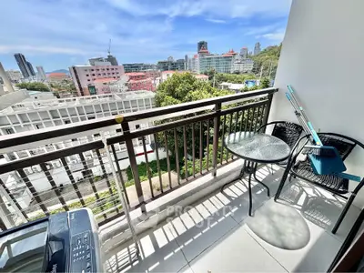 Charming balcony with city view, perfect for relaxation and enjoying urban scenery.