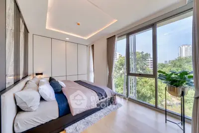 Luxurious bedroom with floor-to-ceiling windows and stunning city view