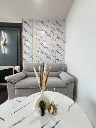 Modern living room with marble accents and stylish decor