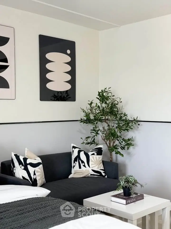 Stylish modern living room with chic decor and cozy seating area.