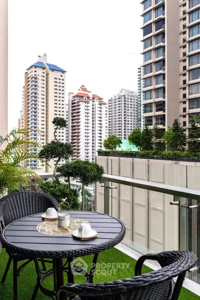 Chic balcony with city view, perfect for relaxing and enjoying urban living.