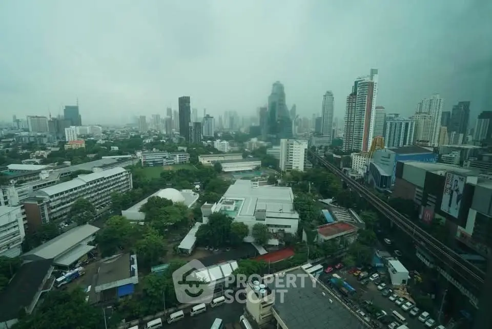 Stunning cityscape view showcasing modern skyscrapers and lush greenery, perfect for urban living enthusiasts.