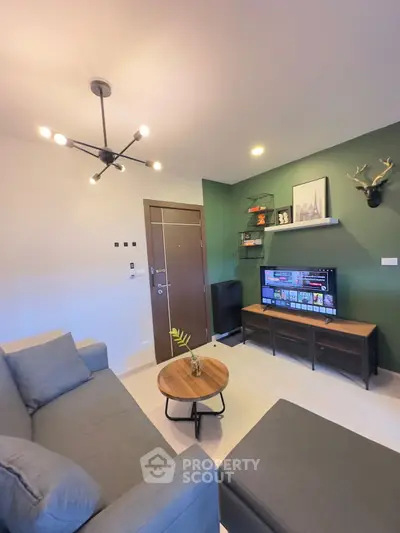 Modern living room with stylish decor and entertainment setup