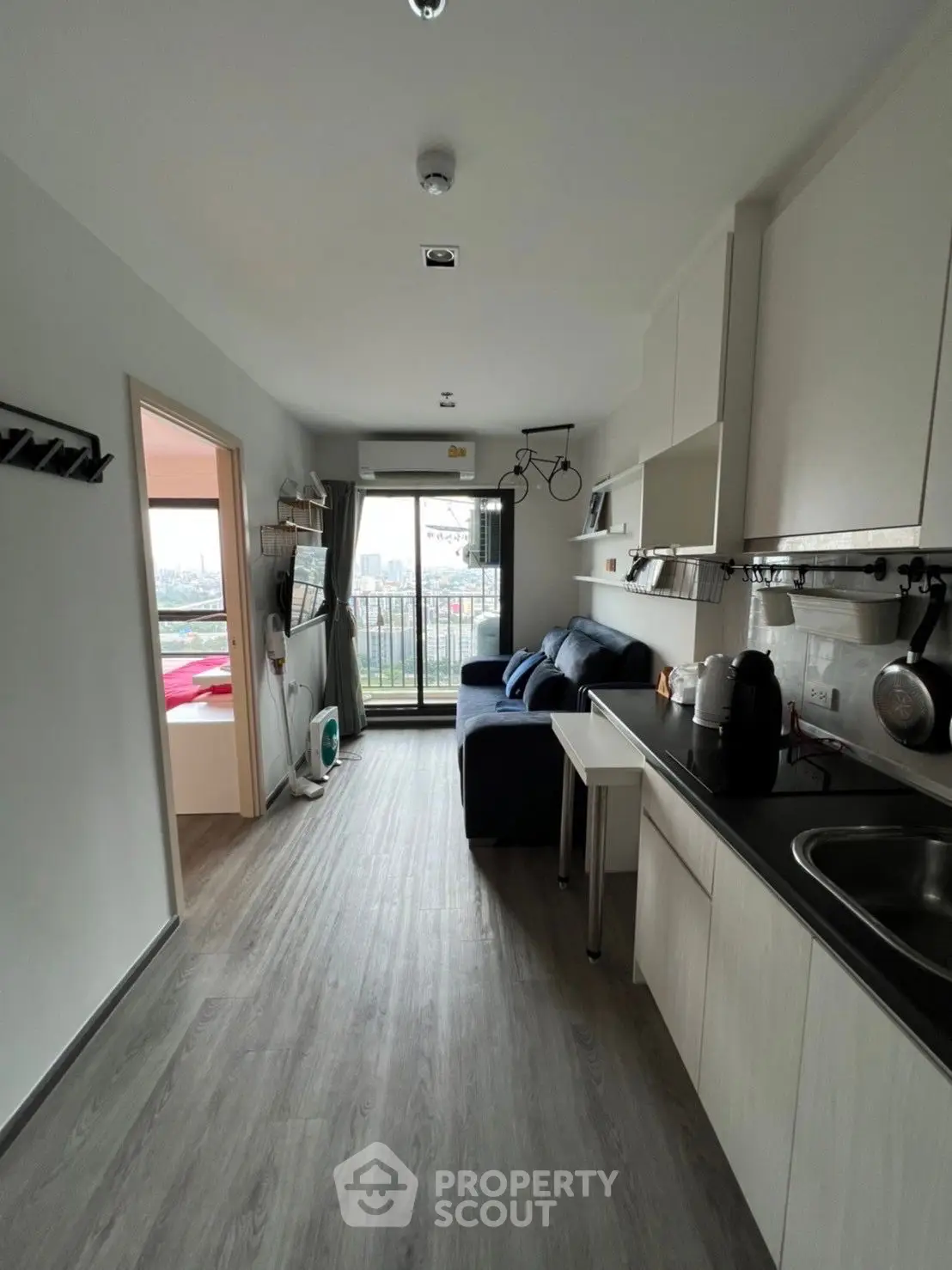 Modern apartment with open layout and balcony view