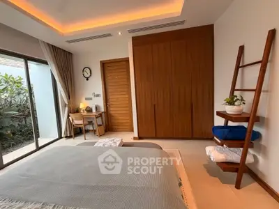 Luxurious bedroom with modern decor and garden view, featuring elegant wooden accents and ambient lighting.