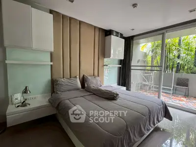 Modern bedroom with balcony view and stylish decor