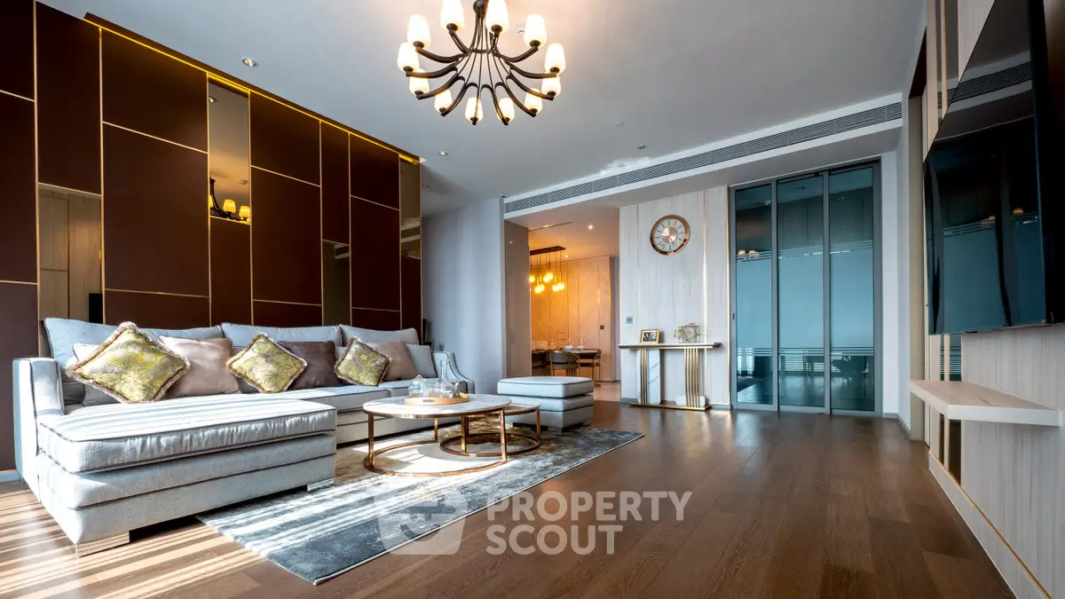 Luxurious modern living room with elegant chandelier and stylish decor