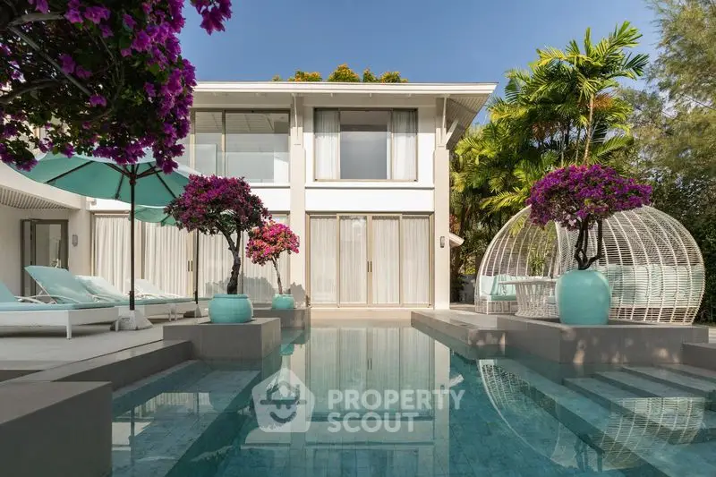 Luxurious modern villa with private pool and lush garden, perfect for serene living.