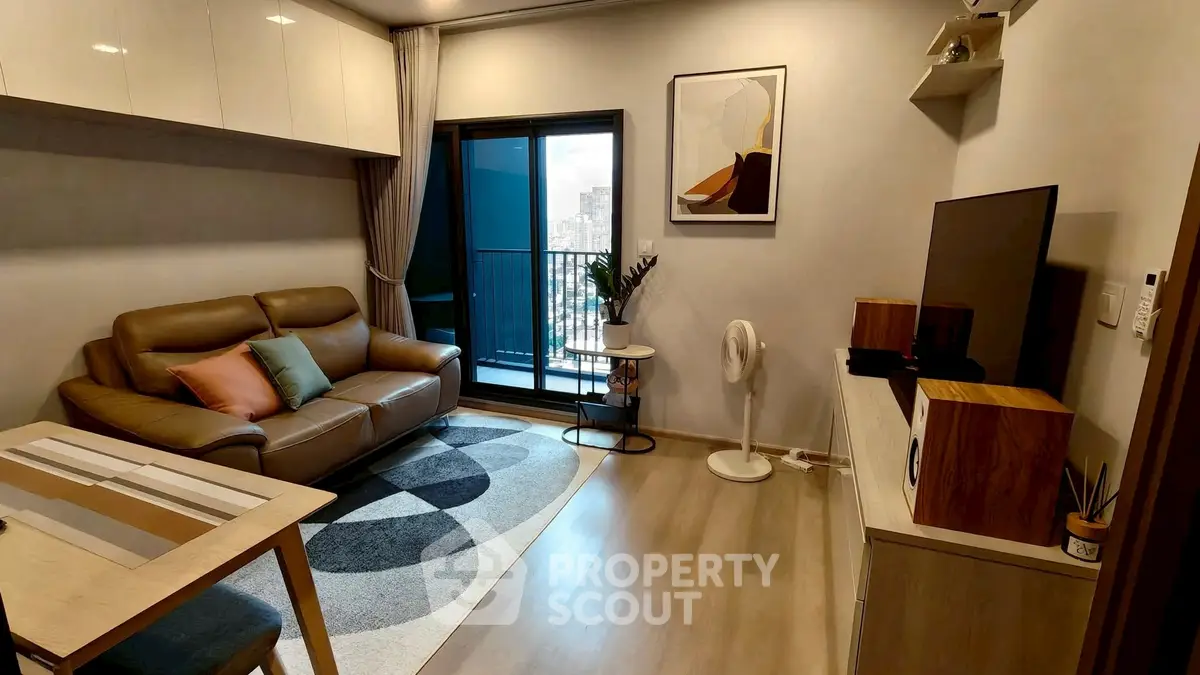 Modern living room with balcony view and stylish decor