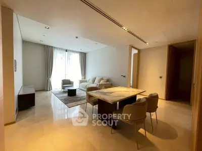 Spacious modern living room with elegant dining area and natural light