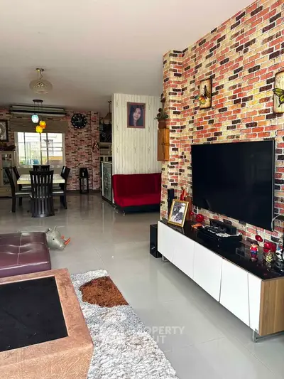 Stylish living room with brick accent wall and modern decor