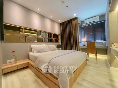 Modern bedroom with stylish decor and natural lighting