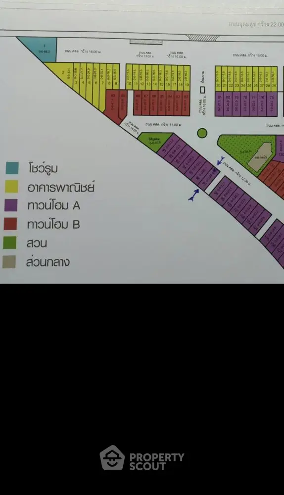 Color-coded real estate plot map with various zones and labels.