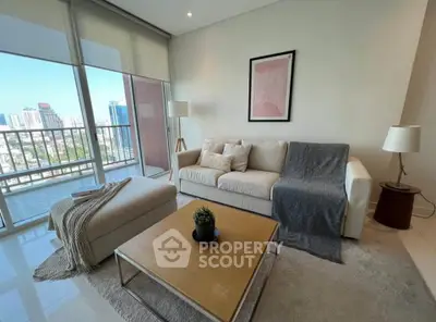 Modern living room with city view, featuring cozy sofa and stylish decor, perfect for urban living.