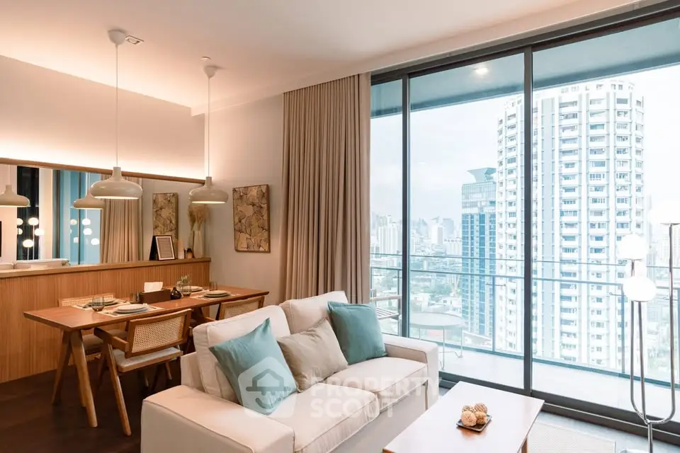 Modern living room with elegant decor and city view from large windows