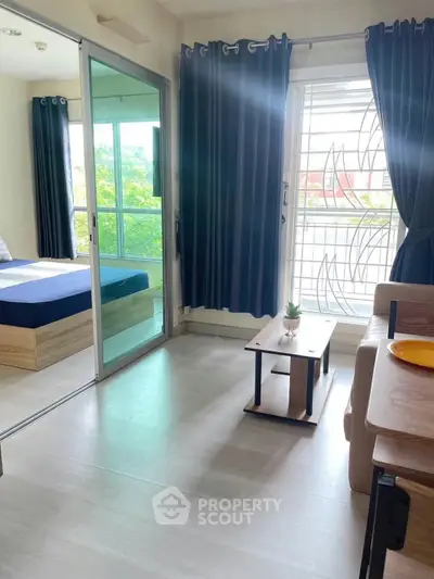 Modern apartment interior with sliding glass doors and stylish decor