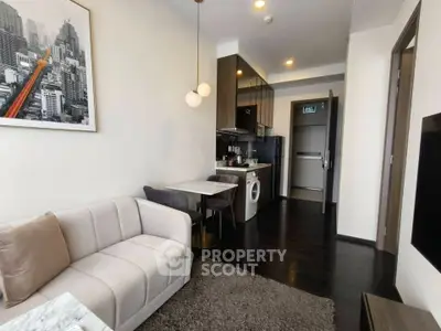 Modern apartment living room with stylish kitchen and cozy seating area