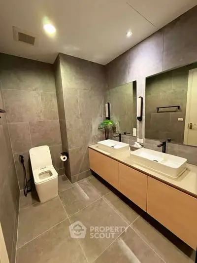 Modern bathroom with dual sinks and sleek design