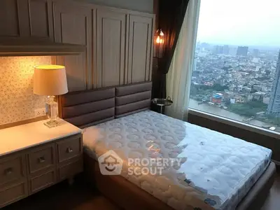 Luxurious bedroom with city view and elegant decor