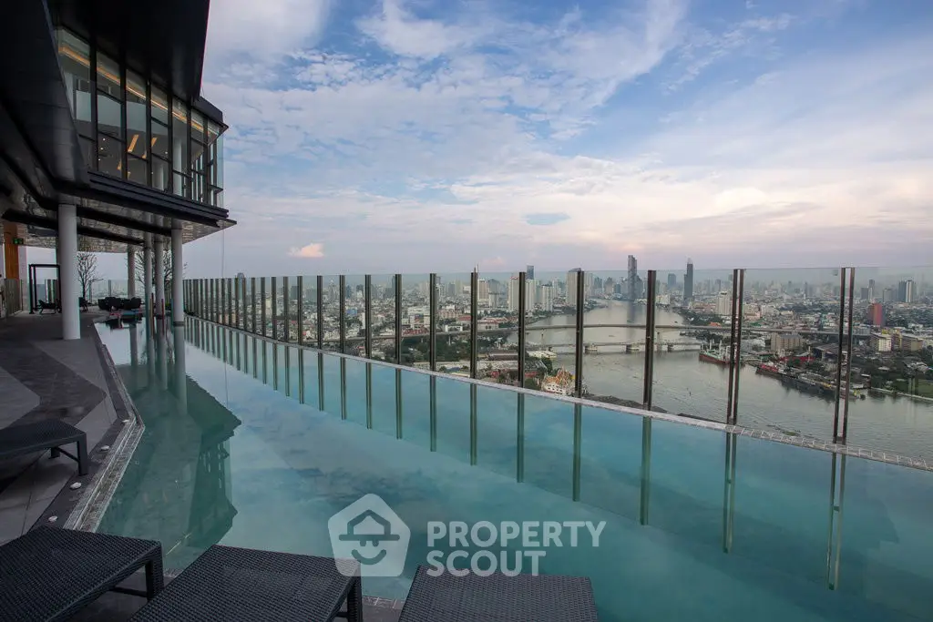 Stunning rooftop infinity pool with breathtaking city skyline view