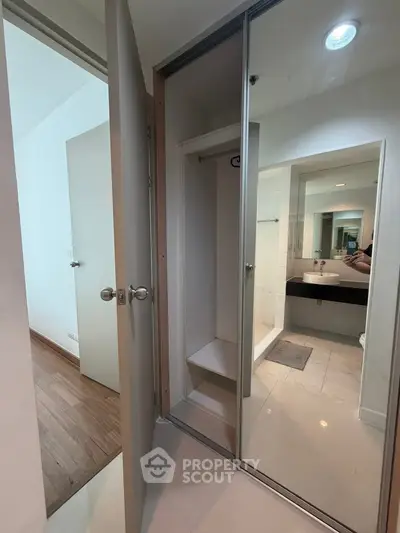 Modern bathroom with sleek design and glass shower enclosure