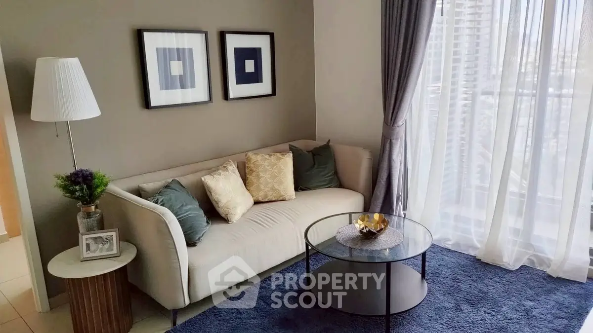 Chic living room with modern decor and large window view