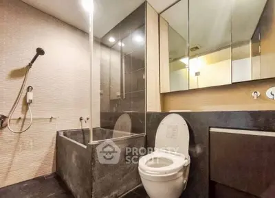 Modern bathroom with sleek design and bathtub in luxury apartment