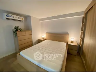 Cozy bedroom with wooden furniture and ambient lighting