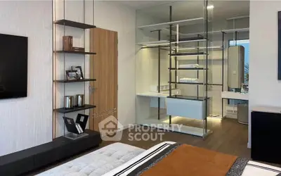 Modern bedroom with glass walk-in closet and sleek decor