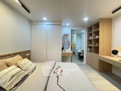 Modern bedroom with built-in storage and cozy decor