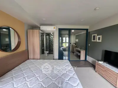 Modern bedroom with ensuite bathroom and stylish decor