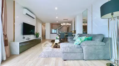 Luxurious modern living room with stylish decor and open layout, perfect for relaxation and entertainment.