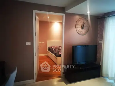 Modern apartment interior with cozy bedroom and stylish living area