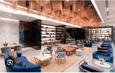 Luxurious modern living room with elegant blue sofas and stylish decor